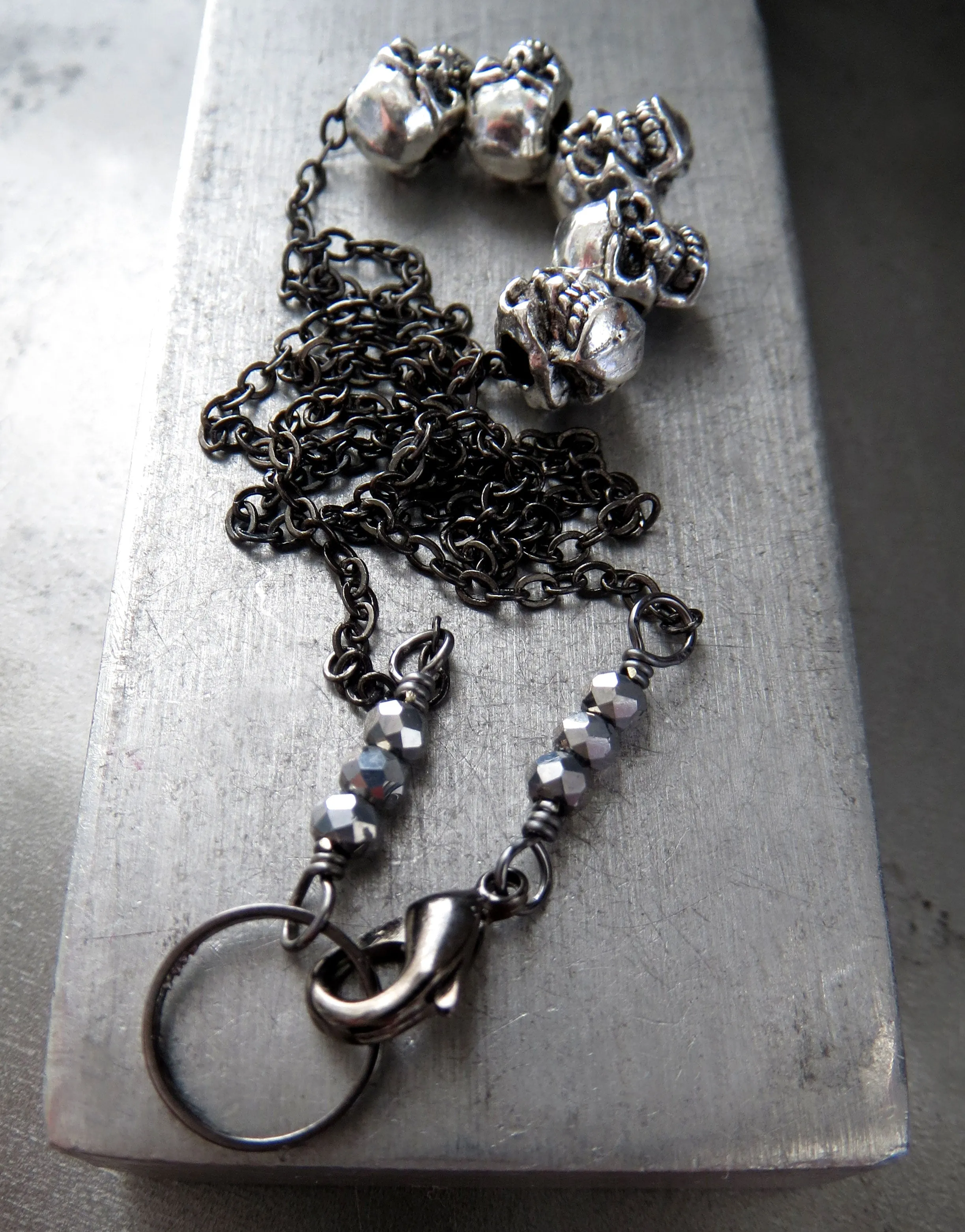 Five Teeny-Tiny Silver Skulls Necklace