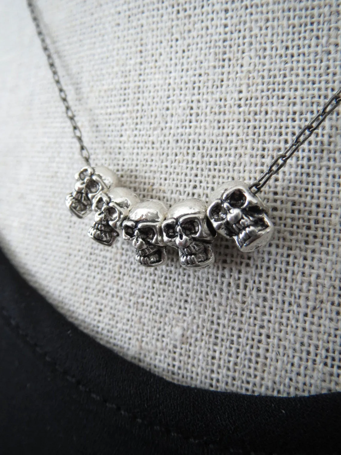Five Teeny-Tiny Silver Skulls Necklace