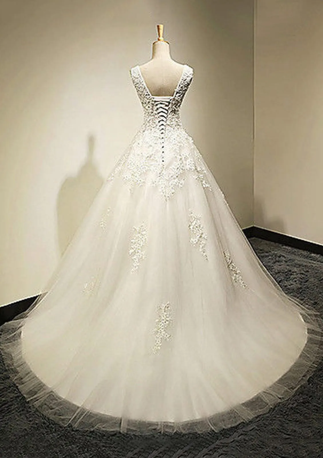 Ivory Tulle A-Line Bateau Sleeveless Court Train Wedding Dress