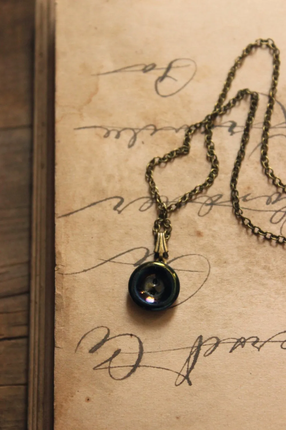 The Eye of Moriarty. Storyteller Series. Antique Glass Button Necklace.