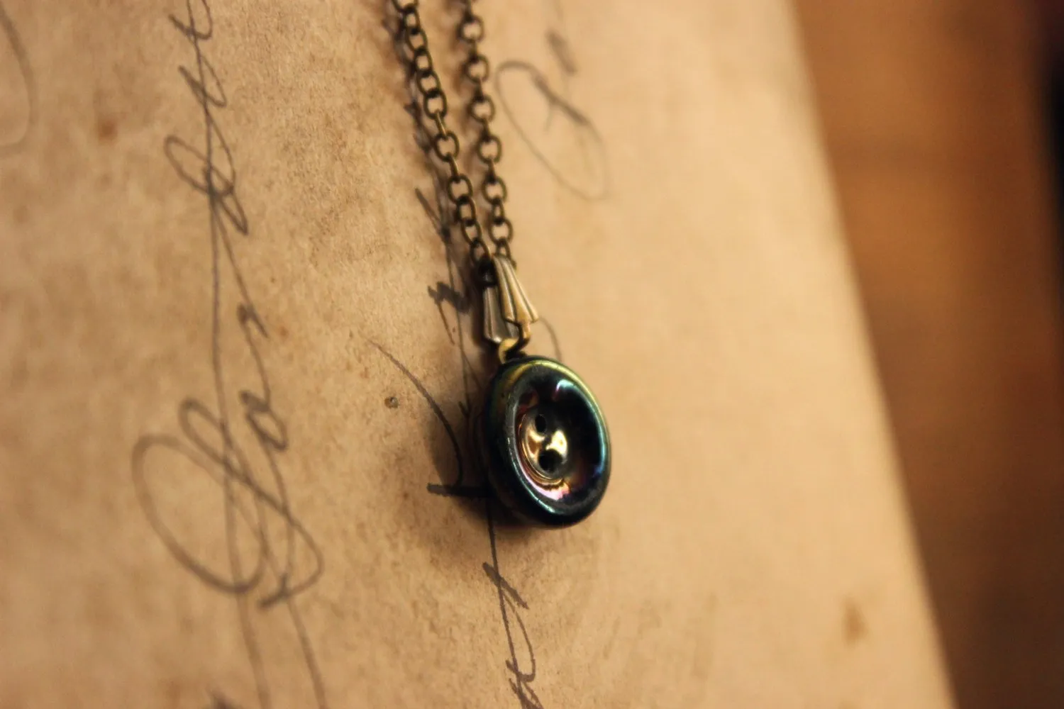 The Eye of Moriarty. Storyteller Series. Antique Glass Button Necklace.
